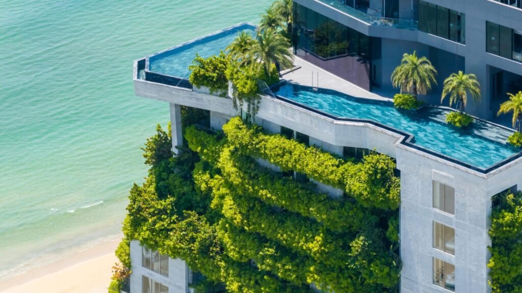 Rooftop infinity pool and lush green architecture at M Hotel Danang near An Thuong area