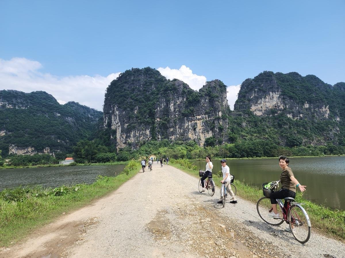 Family cycling tour in Ninh Binh Vietnam countryside
